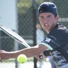 Southern Lakes representative Kai Milburn eyes up a return during the Otago Open on Sunday. PHOTO...