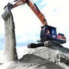 Defending national excavator operator champion Troy Calteaux, of Milton, brushes up his skills in...