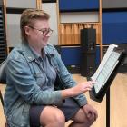 Composer Maddy Parkins-Craig follows the score at a rehearsal of her work TwentyNineteen. Photos:...