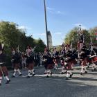 The North Otago Highland Pipeband makes its way down Thames St in Oamaru for the Anzac Day Parade...