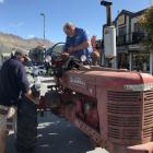 Tractor enthusiast Andrew Davey (right), of Temuka, was embarrassed to break down in Wanaka's...