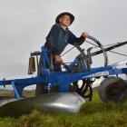 Colin Boon, of Ashburton, tweaks his vintage Reid &amp; Gray plough during practice day at the NZ...