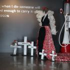 Designer Charlotte Graff hand-stitched 2779 poppies on to the train of the Anzac Angel garment,...