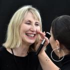 First-time model Jennifer McKean gets her makeup applied by makeup artist Ciara Fitzsimons at the...