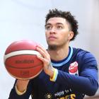 American import JaQuori McLaughlin lines up a shot at the Edgar Centre yesterday. PHOTO: LINDA...