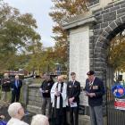 Leading the rededication ceremony for the North East Valley War Memorial Archway were (from left)...