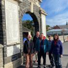 Otago Military History Group members (from left) Rev David Crooke, Graham Harvey, co-chair Peter...