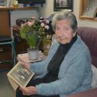 Dunedin resident Betty May Hudson with a family photo at her North Dunedin home on her 101st...