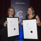 Shelley Griffiths (left) and Carole Adair with their certificates from Chartered Accountants...