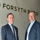 Damian Foster (left) has taken over from Ken Lister as Forsyth Barr’s Dunedin branch manager....