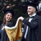 Juhi Bhatia and Daniel Mitten graduated with bachelor of commerce degrees from the University of...