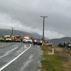 Emergency services - including a rescue helicopter - at the scene of a crash near Roxburgh. Photo...
