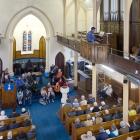 David Burchell plays the organ to an audience that filled the pews of Iona Church in Port...