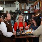 'Sunrise' breakfast show presenter Katie Brown (centre) speaks to Craftwork Brewery owners Lee...
