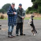 Eddie Conlan (left) has a cuppa with fellow triallist Russell Peek and his dog, Rose, at the...