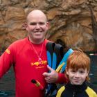 Dunedin pupil Cormac McAvinue (9) and his father Shawn prepare to disembark the boat Perfect Day...