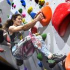 Emily Lane contemplates her next move up the wall, climbing for the NZAC National Indoor...