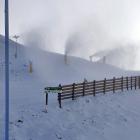 Snow-making equipment blasts freshly made snow yesterday on top of the 20cm dump of powder...