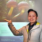 Benny Chia, of Arrowtown, shows a winning smile at the 2023 Tūhura Photography Competition awards...