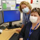 Clutha Health First chief executive Sharon Mason (rear), and IT co-ordinator Trudie Farquhar try...