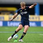 Highlanders replacement Cameron Millar kicks at goal during his side’s Super Rugby Pacific game...