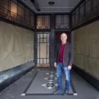 Thomas McLean stands in the doorway of what was Modern Books in Moray Pl, where Rona Dyer painted...