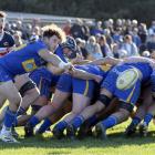 Taieri halfback Bob Martin clears the ball from a scrum during a Dunedin premier game against...
