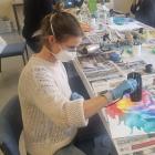 Helen Stewart is all concentration in the Creative Collage Landscapes workshop. PHOTO: BEN TOMSETT