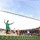 Lindsey Horan, of the United States, scores against the Netherlands at Wellington Regional...