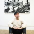 Queenstown-based artist Marc Blake in front of his artwork Diamond 
...