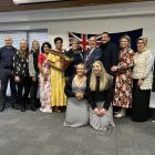 Celebrating NZ citizenship after a ceremony in Alexandra last week are (back from left) Paul...