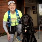 Blair McConnell's black Labrador guide dog Oakley stays home when he goes running. Photo: Geoff...