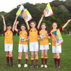 Practising for their role at the Fifa Women’s World Cup are (from left) Olivia McIntyre, 12, Ava...