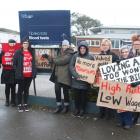 Awanui Labs phlebotomists picketed outside their workplace on Wednesday morning, seeking fairer...