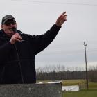 PGG Wrightson auctioneer Ross McKee at work at the 64th annual Gore Dog Sale in 2021. PHOTOS: SRL...