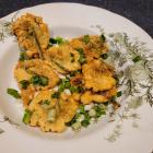 The flower heads, dipped in batter, make an oniony fritter. Photos: Hilary Rowley