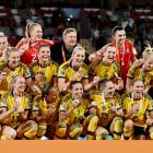 The Swedish team celebrate after receiving their third place medals. Photo: Reuters