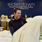 Eiderdown's sales director Lucas Mills with some of the wool used in the company’s various...