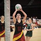 James Hargest pupil Elly Baird, 15, takes a shot at goal during a game against Burnside High...