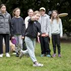 Sarah Wadsworth, 8, demonstrates her world champion disc golf style at a coaching workshop at...