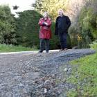 Islay St residents Shirley and Paul Bellugue are concerned about the state of their gravel road....