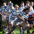 Otago Boys’ No 8 Phoenix Tapatu carries the ball against John McGlashan during their semifinal on...