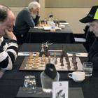 Invercargill player Edward Lee (left) and Hamish Gold, of Dunedin, concentrate during a game...