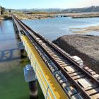 An upgrade of the rail bridge over the Waikouaiti River could be finished by the end of next year...