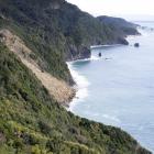 The massive slip just south of Knights Point on State Highway 6, looking south towards Haast. The...