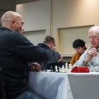 Chess players ponder their moves in the South Island championships at the ...