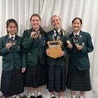 The Columba badminton team won the New Zealand division 2 tournament to be undefeated this year...