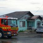 Fire crews had to cut padlocks to get side access to this house in Caledonian Road. Photo: Wyatt...