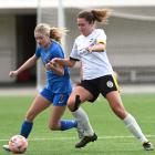 Southern United midfielder Abby Rankin tries to beat Eastern Suburbs defender Kenya Brooke on the...