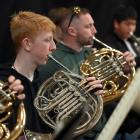 French Horn player Damian Dyke, 15, of Logan Park High School (left) and Christian Martin who...